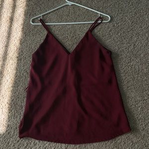 maroon blouse with cross strings in the back